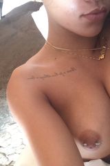 Rihanna nipple piercing