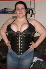 my girlfriend wearing a leather corset