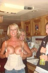 Mom with embarrassed daughters.