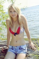 Skinny blonde lakeside