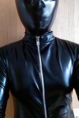 [M]e in a shiny suit and hood