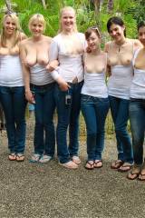 10 girls in blue jeans flashing their boobs