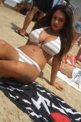 Busty beach brunette