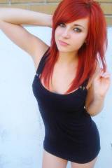 Red hair, black dress
