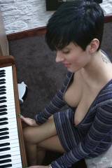 At the piano