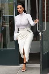 Kim Kardashian hourglass curves in white (X-post /...