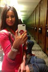 Super hot chick taking a selfie while on the toilet
