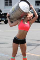 Girl lifting Keg