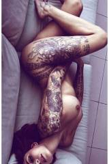 Nude & tattooed