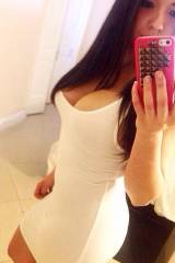 Cute Latina in tight white dress