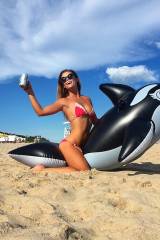Nina Agdal riding a whale