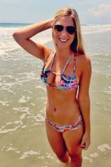 Busty blonde bikini beach babe