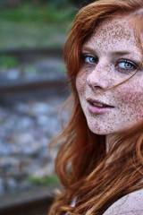Lovely freckles with amazing eyes.