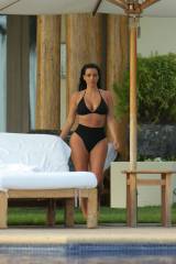 Kim Kardashian's curves in a black bikini