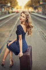 Blonde woman travelling in style