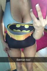 Batgirl bursting out of her swimsuit