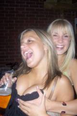 Trying to contain her friends awesome cleavage