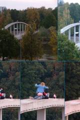 Couple having fun on top of bridge