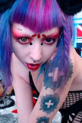 This crazy whore did an abortion theme on Hallowee...
