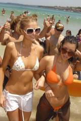 Paris Hilton and Kim Kardashian at the beach