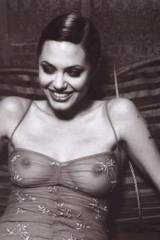 Angelina Jolie laughing at a joke [B/W]