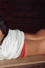 Olivia Munn laying down
