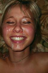 Having a GREAT time getting jizz blown all over her face!