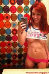 Redhead selfie with underboob and nice abs