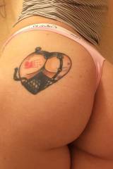 Tattoo of a nice ass on her nice ass