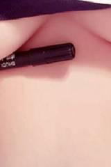 Putting a pen under your boobs