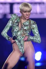 Miley Cyrus - Forgets her pantyhose.