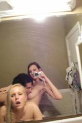 three some bathroom selfie