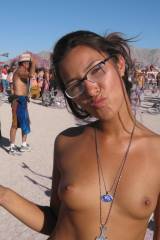 Topless babe enjoying the Burning Man gathering in...