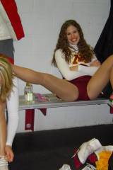 Real college cheerleader spreads her legs and smil...