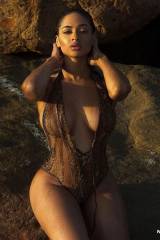 Tori Hughes showing off her wet curves