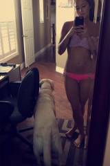 Girl in a Bikini with her Dog