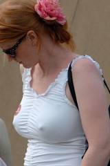 Redhead MILF with a fairly serious rack on her. x-...
