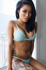 Asian bikini babe with a sexy tatt