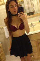 Red bra, black skirt selfie