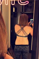 trying on sports bras