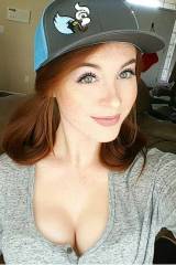 Redhead; cleavage; hat