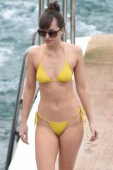 Dakota Johnson in an itsy bitsy (see through) yellow bikini