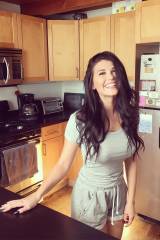 Cute girl in a sexy kitchen