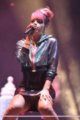 Lily Allen performing on stage