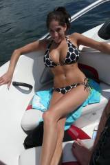 Tiny and busty on a boat