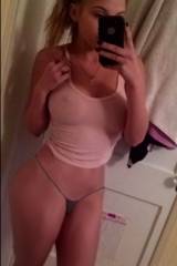 Blonde in a pink tank top and tiny g-string