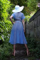 Sheer vintage 1950s dress, heels and hold-ups. De...