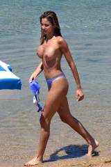 Adriana Volpe walking at the beach