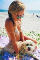 Girl and dog at beach