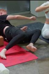 Katy Perry slipping a nip while doing yoga.